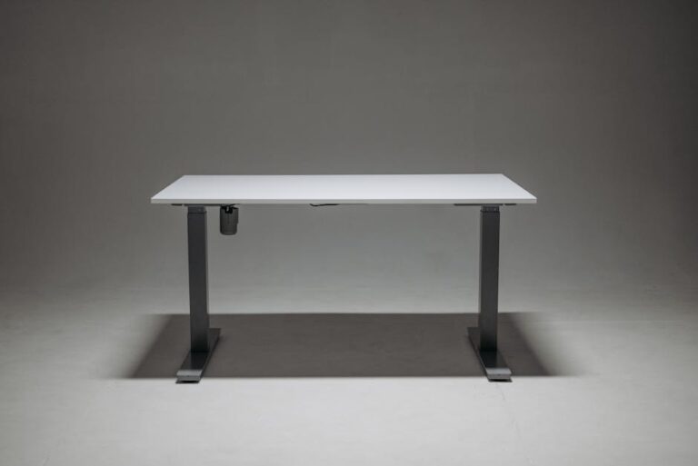 Sleek adjustable height standing desk with a single motor for ergonomic office solutions.
